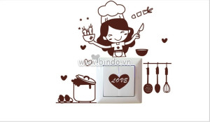 Decal dán tường Dán ổ điện cô gái làm bếp