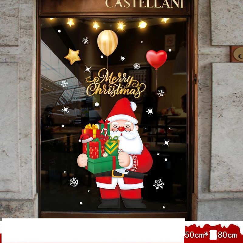 Decal dán tường Decal Noel - Ông già cầm hộp  quà (H) Decal dán tường Decal Noel - Ông già cầm hộp  quà (H)