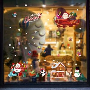 Decal dán tường Noel 112 - Ông già noel lái phương tiện giao thông
